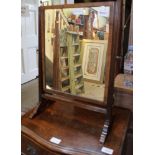 A MAHOGANY FRAMED ADJUSTABLE PLAIN PLATE DRESSING TABLE MIRROR