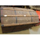 A WOOD & METAL BOUND DOME TOPPED STEAMER TRUNK