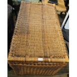 A LARGE WOVEN WICKER BOX COFFER containing a wicker log basket