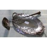 AN ART NOUVEAU PLATED TWIN HANDLED DISH, together with a secessionist handled fluted ladle, on