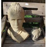 TWO CAST CONCRETE HEADS