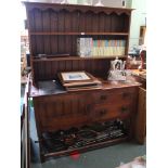 A LATE 19TH / EARLY 20TH CENTURY ARTS & CRAFTS INFLUENCED OAK DRESSER with twin shelved plate rack