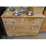 A 19TH CENTURY STYLE STRIPPED PINE CHEST OF DRAWERS fitted two short and two long drawers, width