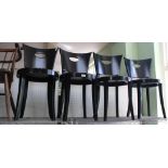 A SET OF FOUR BLACK PAINTED MODERN CAFE STYLE CHAIRS