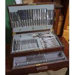 A MAHOGANY CANTEEN containing a selection of Art Deco design Elkington cutlery