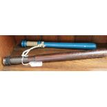 TWO TURNED WOODEN TRUNCHEONS, one painted