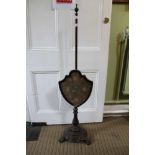 A 19TH CENTURY ROSEWOOD POLE SCREEN with shield shaped panel