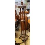 A FIRST QUARTER 20TH CENTURY WOODEN FREESTANDING COAT RACK