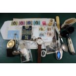 A TRUCKLE OF COLLECTOR'S ITEMS VARIOUS, to include stamps, a wristwatch, an eye bath and a file of