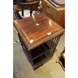 AN EARLY 20TH CENTURY INLAID MAHOGANY REVOLVING BOOKCASE