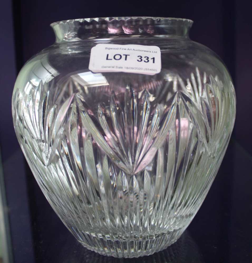 A 20TH CENTURY CUT LEAD CRYSTAL VASE with star cut base, 18cm high