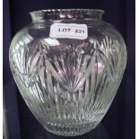 A 20TH CENTURY CUT LEAD CRYSTAL VASE with star cut base, 18cm high