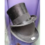 A TOP HAT AND A BOWLER HAT