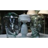 TWO MODERN BLOWN GLASS DISPLAY HEADS together with a milk glass columned oil lamp and shade