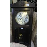 A 20TH CENTURY OAK FINISHED VIENESE STYLE HANGING WALL CLOCK