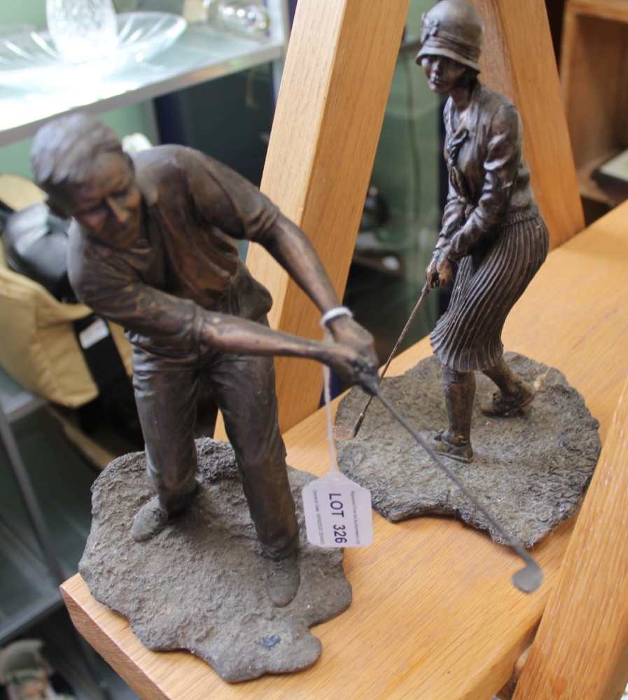 TWO PATINATED CAST FIGURINES OF GOLFERS