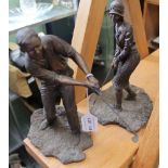 TWO PATINATED CAST FIGURINES OF GOLFERS