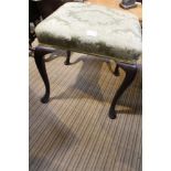 A 19TH CENTURY SQUARE PAD TOPPED STOOL on four cabriole legs