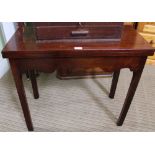 A GEORGE III MAHOGANY TEA TABLE , the rectangular top over a cross grained shaped frieze, on four