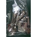 A BAG CONTAINING A LARGE SELECTION OF HALLMARKED SILVER ITEMS to include Georgian table spoons