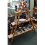 A THREE TIER MODERN OAK SET OF DISPLAY SHELVES