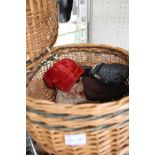 A WOVEN WICKER BASKET CONTAINING A SELECTION OF LADIES PURSES together with an antique boulle work