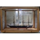 A PINE & GLAZED CASED MODEL SHIP on HMS Warrior