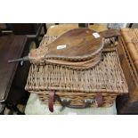 A WOVEN WICKER HAMPER plus contents, together with a pair of elm bellows