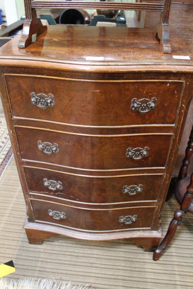 A SMALL SIZED REPRODUCTION SERPENTINE FRONTED FOUR DRAWER CHEST