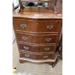 A SMALL SIZED REPRODUCTION SERPENTINE FRONTED FOUR DRAWER CHEST