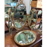 A GILT FRAMED WALL MIRROR together with a TRIPLE PLATE DRESSING TABLE TOP MIRROR