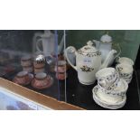 A HAND PAINTED EGGSHELL PORCELAIN JAPANESE COFFEE SET together with three pieces of white glaze