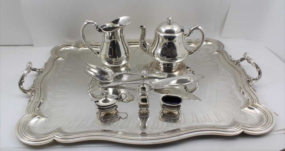 A "CHRISTOFLE" FRENCH SILVER PLATED TWO-HANDLED TEA TRAY, the handles cast acanthus scroll design,