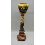 A LATE 19TH CENTURY "BURMANTOFTS" JARDINIERE ON STAND, floral decorated, 127cm high (inclusive)