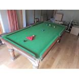 BURROUGHES & WATTS "THE COTTAGE" BILLIARD TABLE, the mahogany frame on turned and fluted legs,
