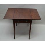 A 19TH CENTURY MAHOGANY PEMBROKE TABLE, having twin flap top, with cutlery drawer with opposing