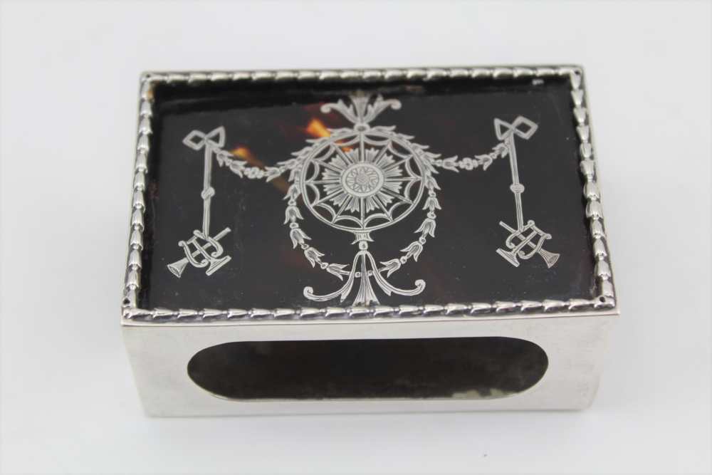 WILLIAM COMYNS & SONS AN EDWARDIAN SILVER & TORTOISESHELL MATCH BOX COVER, London 1907, floral and