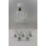AN ART DECO DESIGN DECANTER AND SET OF SIX MATCHING GLASSES, of waisted flared forms, the decanter