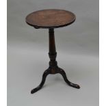A 19TH CENTURY OAK SNAP TOP WINE TABLE, dished top on turned stem and triform supports, 42cm in