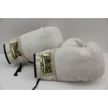 A PAIR OF AUTOGRAPHED LONSDALE WHITE BOXING GLOVES, both signed "Best wishes Lloyd Honeyghan - The