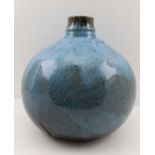 A STUDIO POTTERY EARTHENWARE VASE OF GLOBULAR FORM, narrow neck design, in a mottled blue glaze,