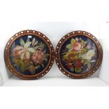 A PAIR OF 19TH CENTURY ROSEWOOD FRAMED WOOLWORK TAPESTRY PANELS, floral designs with roses and