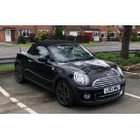 MINI COOPER ROADSTER CONVERTIBLE 1.6, 2 door motor car in black, with fabric soft top, automatic