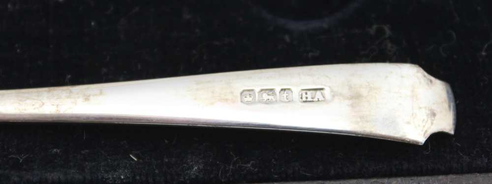 HENRY ATKIN A SET OF TWELVE SILVER TEASPOONS, Sheffield 1937 together with a pair of silver sugar - Image 3 of 3