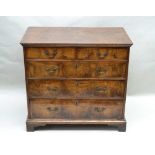A 19TH CENTURY WALNUT FRONTED CHEST OF FIVE DRAWERS, having plain rectangular top over two inline