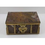 AN EARLY 20TH CENTURY POLISHED STONE TABLE CASKET, gilt metal frame and mounts, 14cm x 9.5cm x 6.5cm