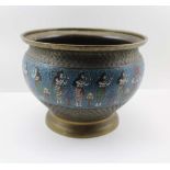 A BRASS JARDINIERE PLANTER with champleve banded decoration in the style of Egyptian figures on a