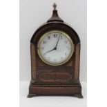 A 19TH CENTURY MAHOGANY CASED MANTEL CLOCK, domed top with finial, circular enamel dial with