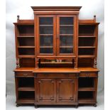 A LATE VICTORIAN MAHOGANY SIDE CABINET, the stepped upper section enclosed by a pair of panel