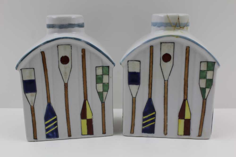 A PAIR OF 20TH CENTURY CONTINENTAL VESSELS OF TEAPOY FORM, hand enamelled with polychrome oars, 12cm